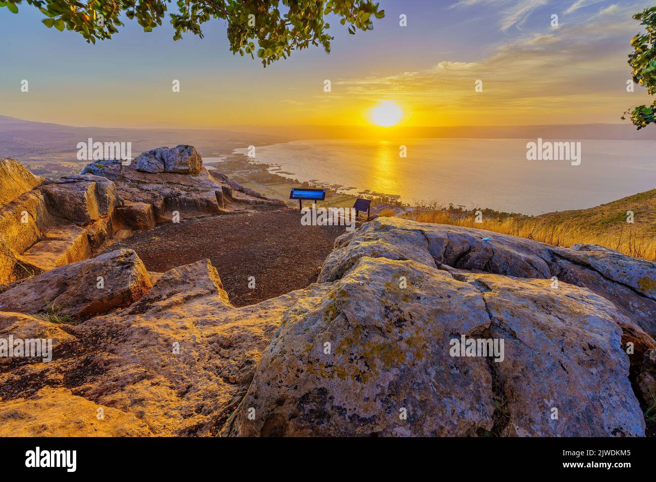 Sunrise view of the Sea of Galilee, from Mount Arbel (west side). Northern Israel. Text on sign: Sea of Galilee Lookout Stock Photo