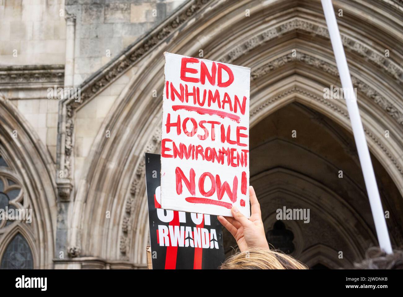 Royal Courts of Justice, Strand, London, UK. 5th Sep, 2022. Protesters have gathered outside the Royal Courts of Justice in protest at the plans to deport people to Rwanda. A postponed judicial review into the legality of the British government’s migrant deportation policy is being held inside Stock Photo