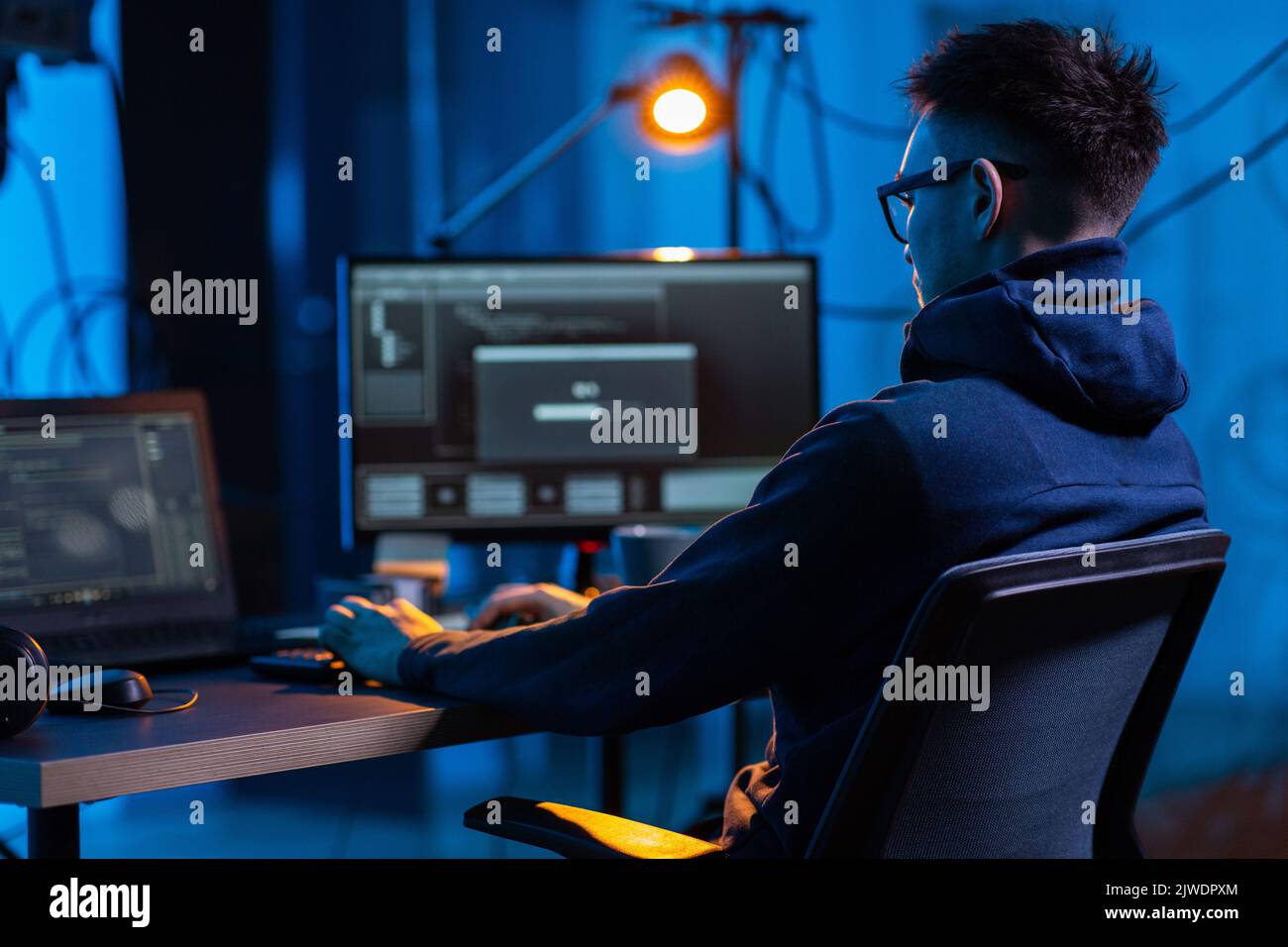hacker using computer virus for cyber attack Stock Photo