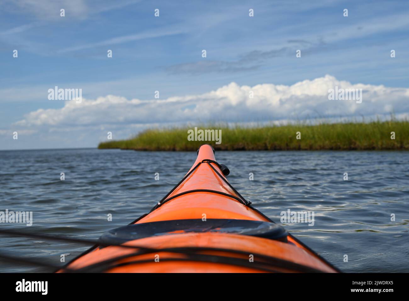 Focus on the bow of a kayak in the Pamlico Sound off the Pea Island Wildlife Refuge, Outer Banks, North Carolina Stock Photo