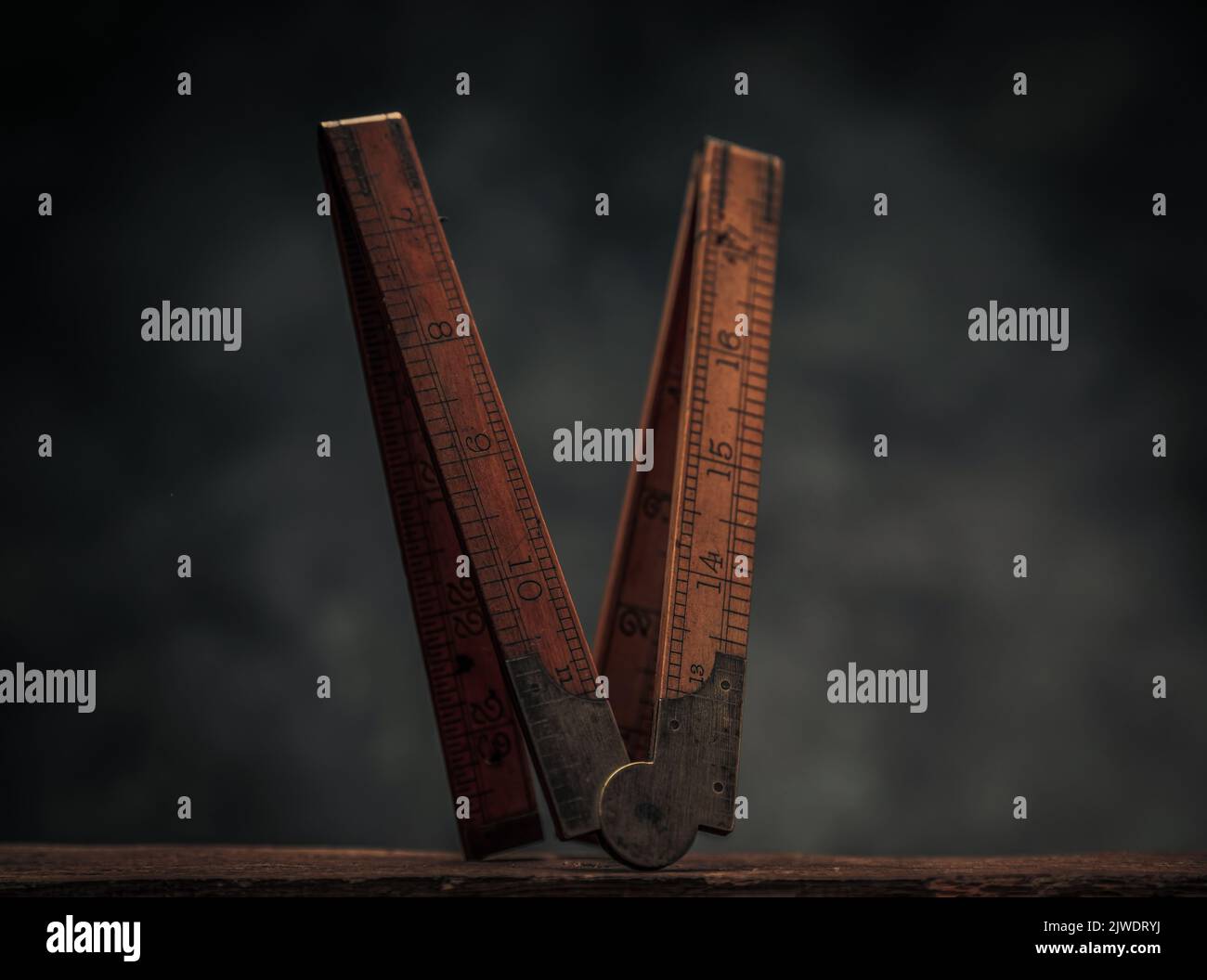 picture of wooden ruler for measuring on top of old rustic workbench in ...