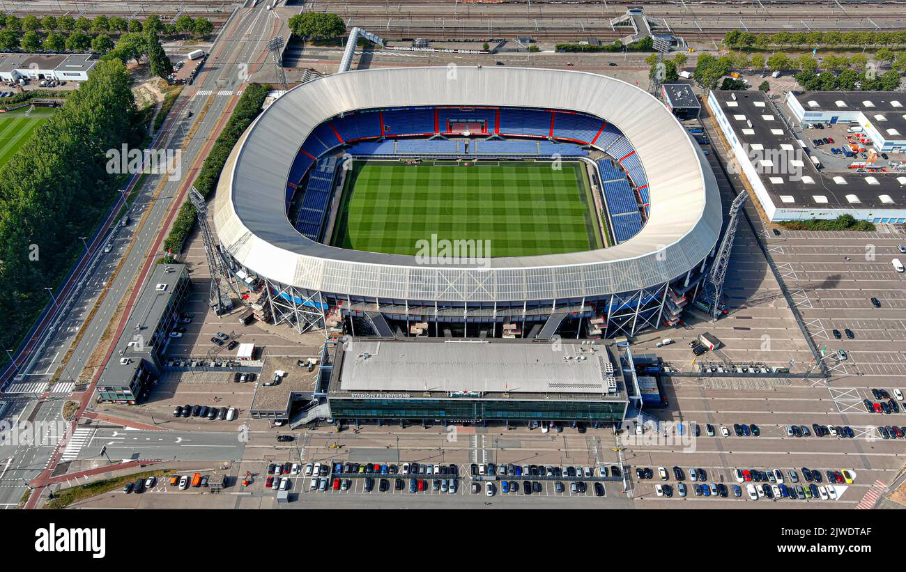 Stadion Feijenoord aerial view, known as De Kuip, is a stadium in Rotterdam, Netherlands. Home stadium of football club Feyenoord flying above Stock Photo