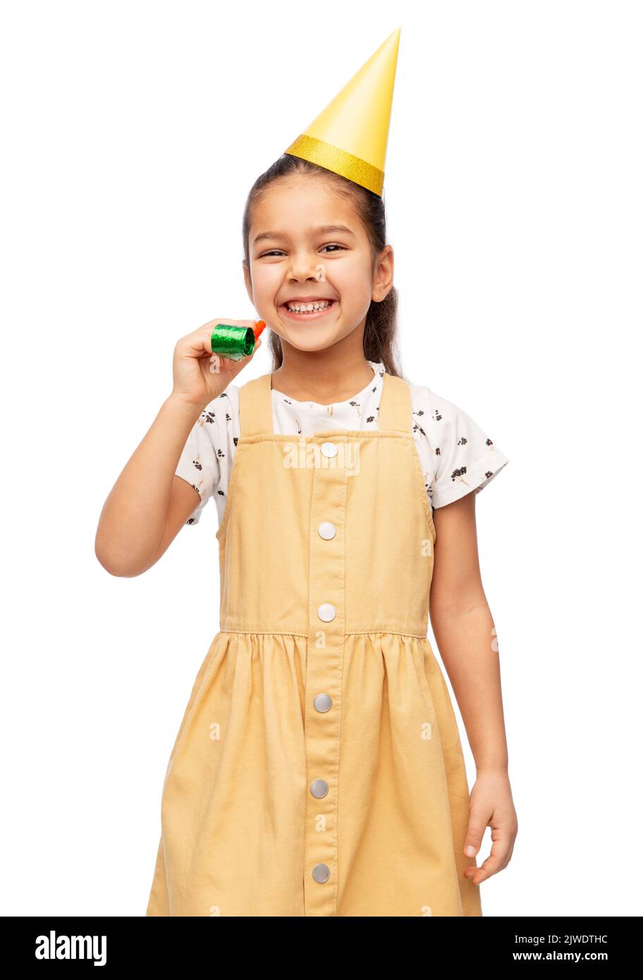 smiling girl in birthday party hat with blower Stock Photo - Alamy