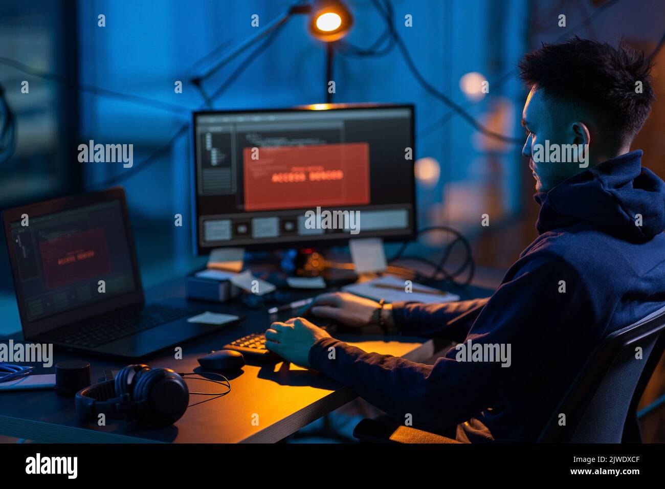 hacker using computer virus for cyber attack Stock Photo
