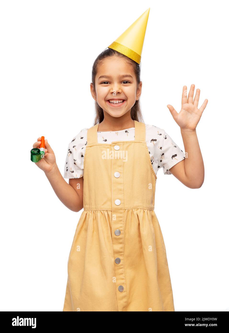 smiling girl in birthday party hat with blower Stock Photo - Alamy