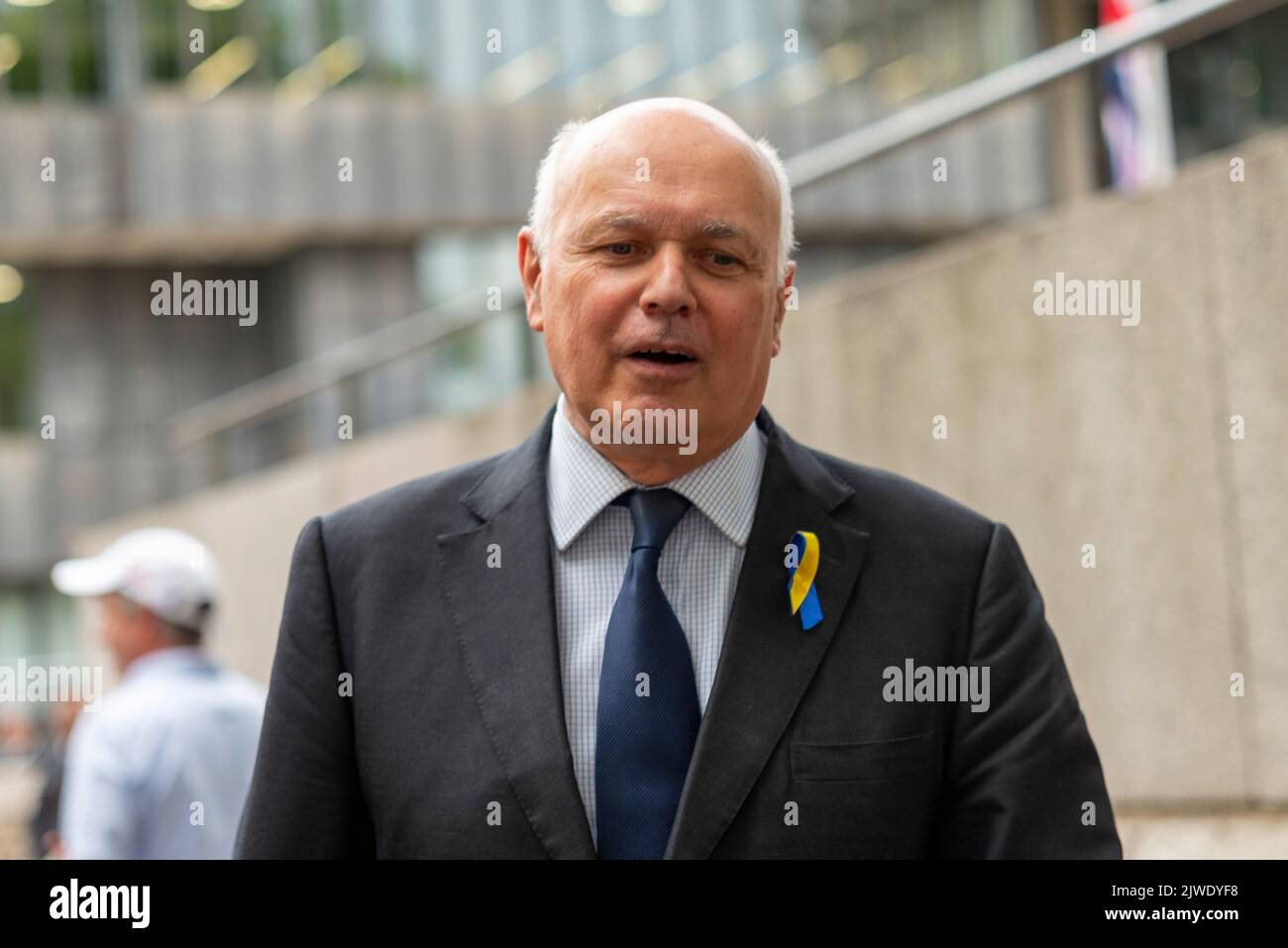 Queen Elizabeth II Centre, Westminster, London, UK. 5th Sep, 2022. Conservative party members and officials are leaving the Centre after choosing Liz Truss as the new leader of the party, and therefore the new Prime Minister. Protesters gathered outside. Iain Duncan Smith MP leaving Stock Photo