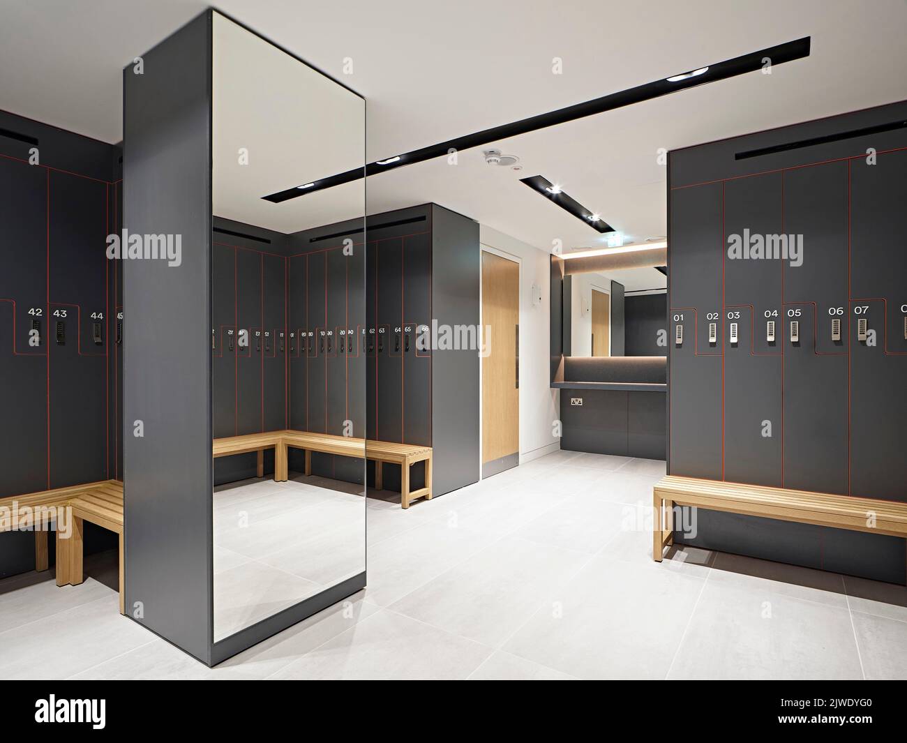 Basement locker rooms. 50 Eastbourne Terrace, London, United Kingdom. Architect Sheppard Robson