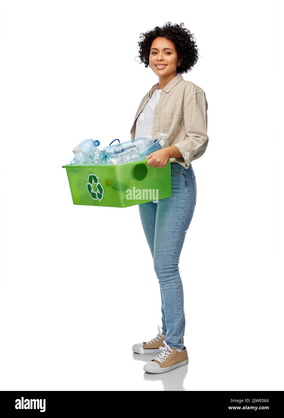 smiling woman sorting plastic waste Stock Photo - Alamy