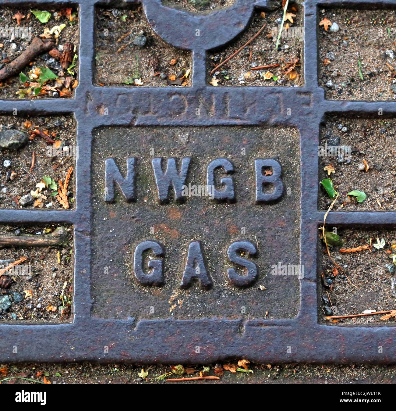 NWGB Gas - North West Gas Board cover, street,road ironwork, Grappenhall, Warrington, Cheshire, England, UK, WA4 2PL Stock Photo