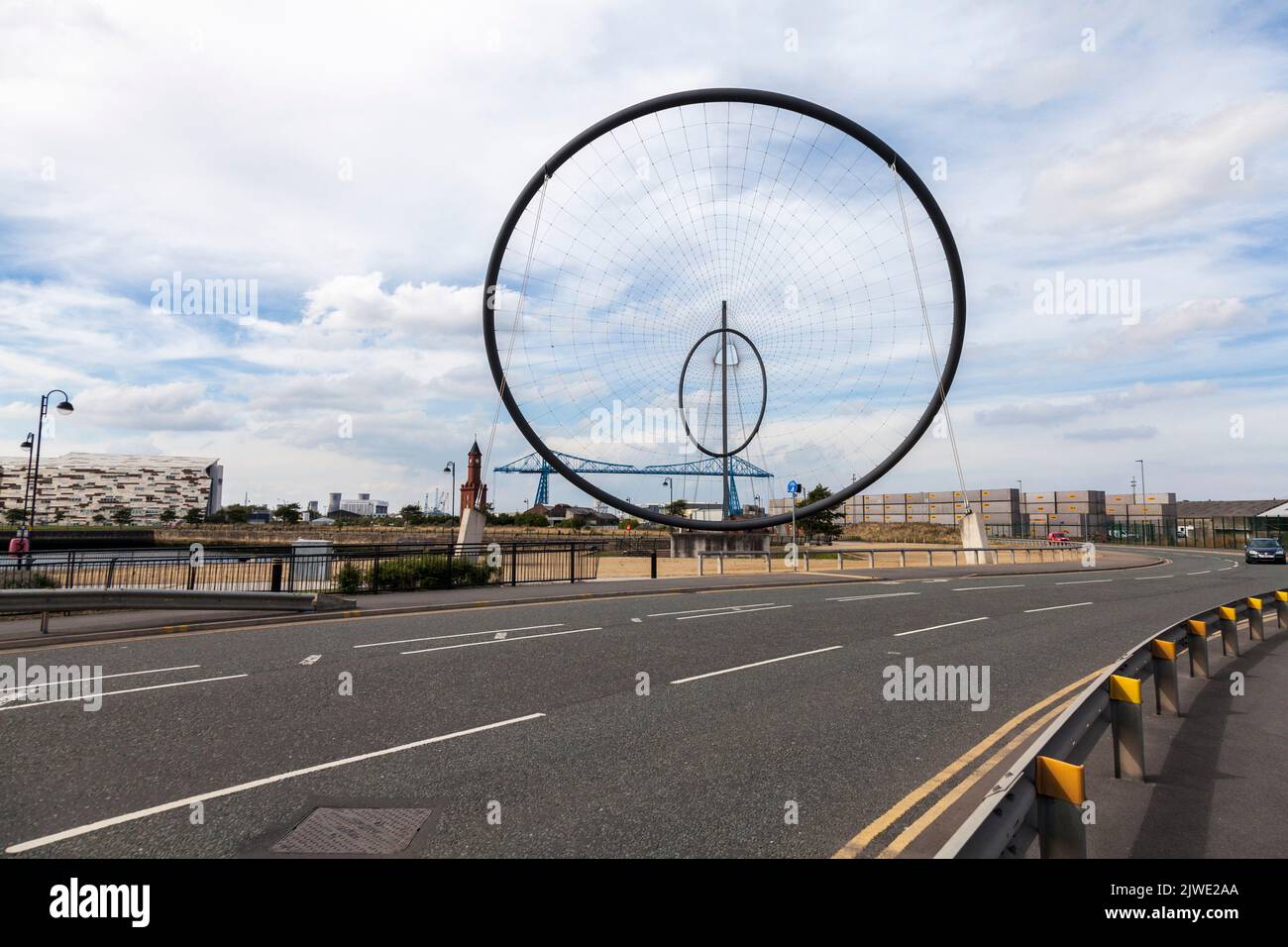 A view of the Temenos art structure by Anish Kapoor with the clock tower and Transporter Bridge in background in Middlesbrough Stock Photo