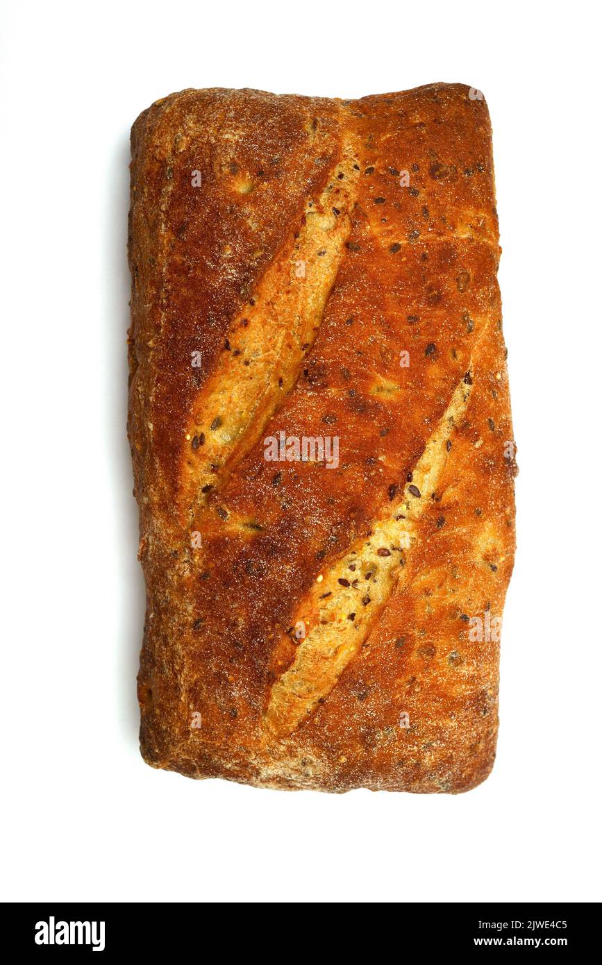 loaf of bread with seeds on white background Stock Photo
