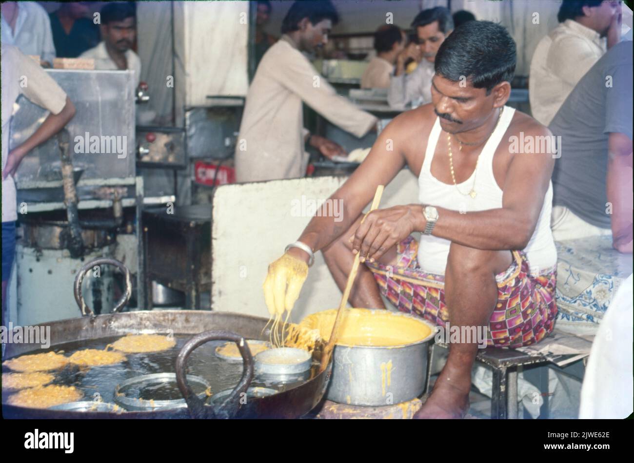 sweet-maker-frying-ghewars-hi-res-stock-photography-and-images-alamy