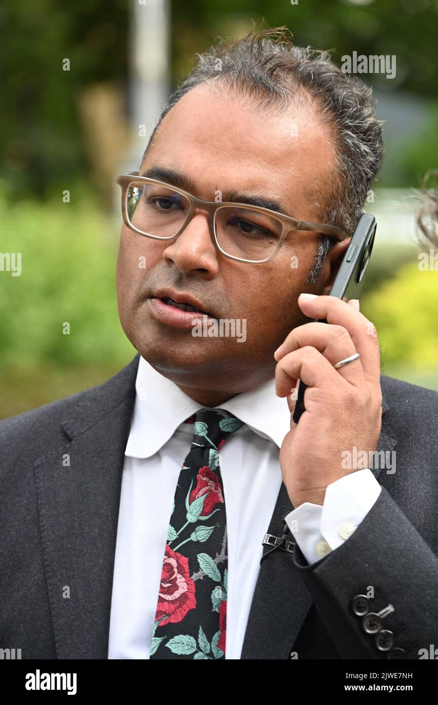London, UK. Kristan Guru-Murthy, Presenter Channel 4 News. Politicians and news presenters gathered on College Green opposite the Houses of Parliament to discuss the Conservative Leadership Announcement. Stock Photo