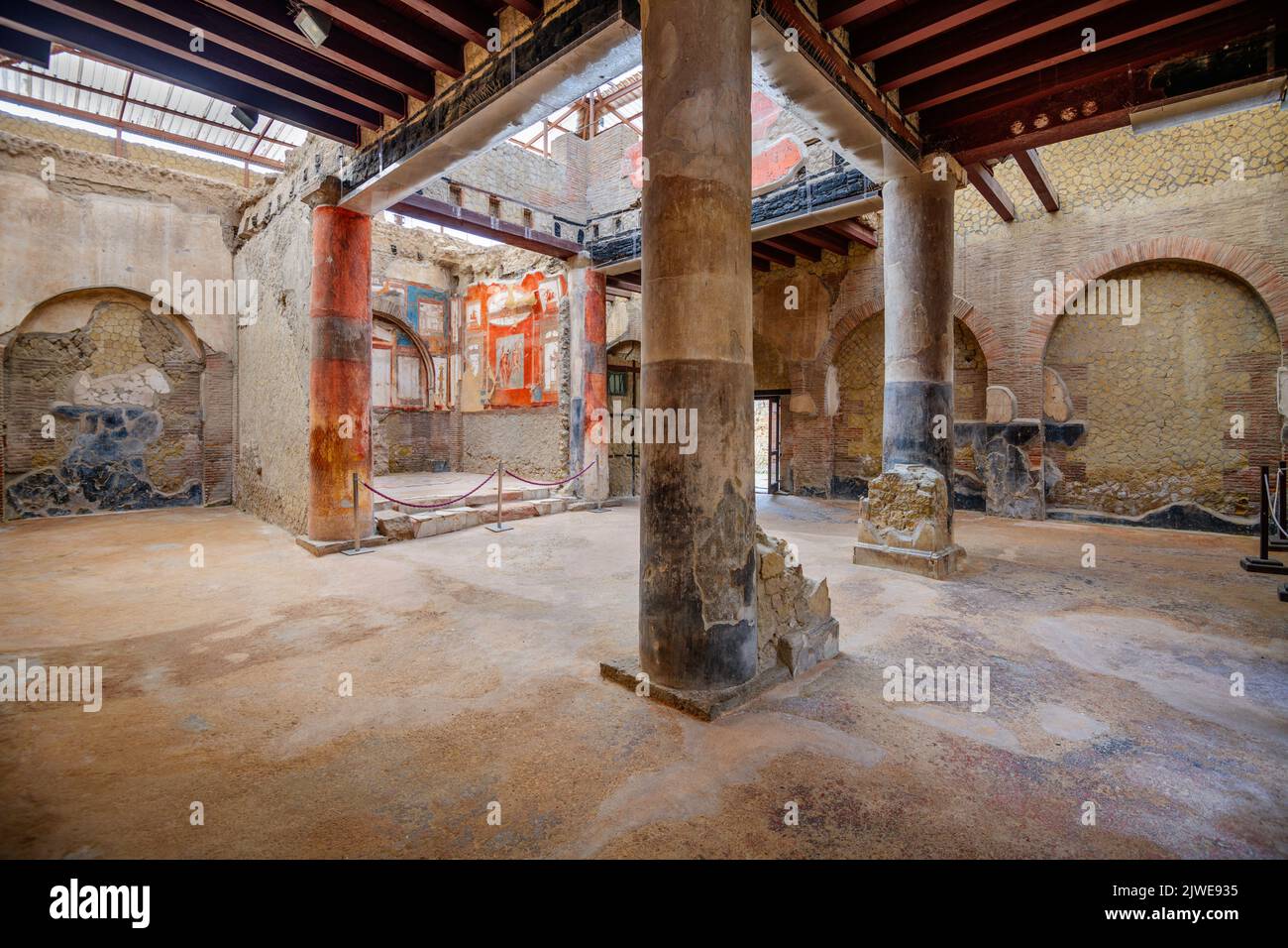 ERCOLANO, ITALY - FEBRUARY 22, 2022: The Hall of the Augustals in the Herculaneum ruins. Stock Photo