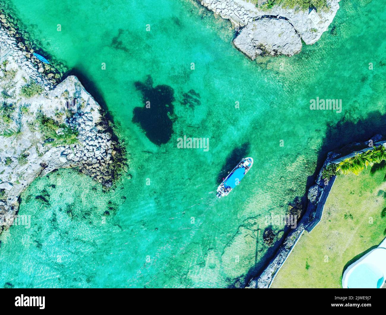 Aerial view of a tourist boat sailing along coastline, Cancun, Mexico Stock Photo