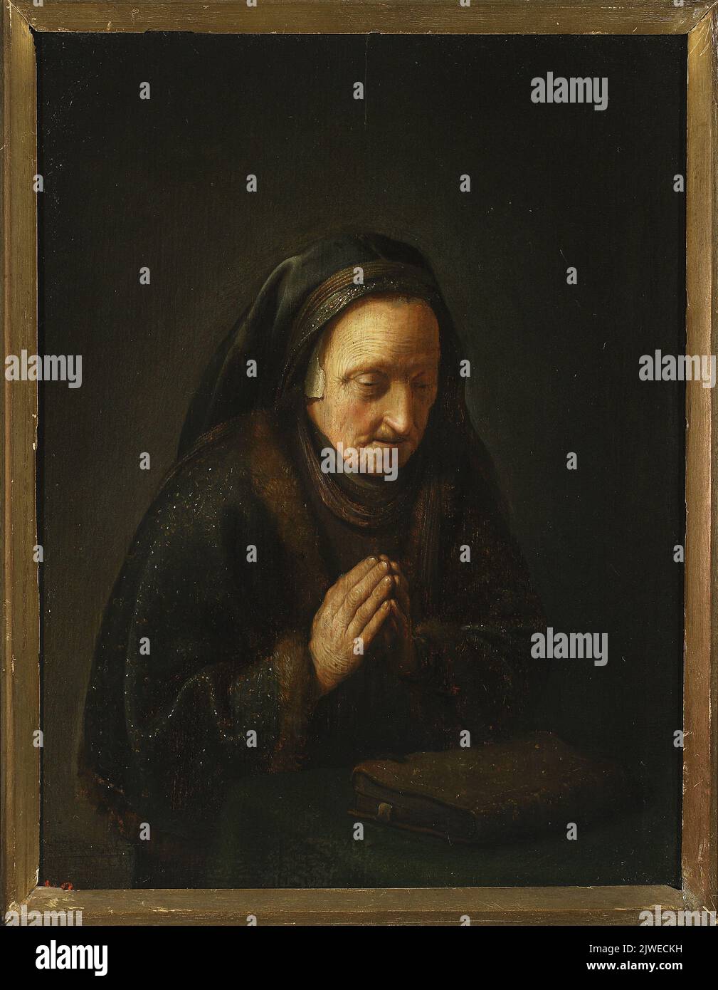 Praying old woman hi-res stock photography and images - Alamy