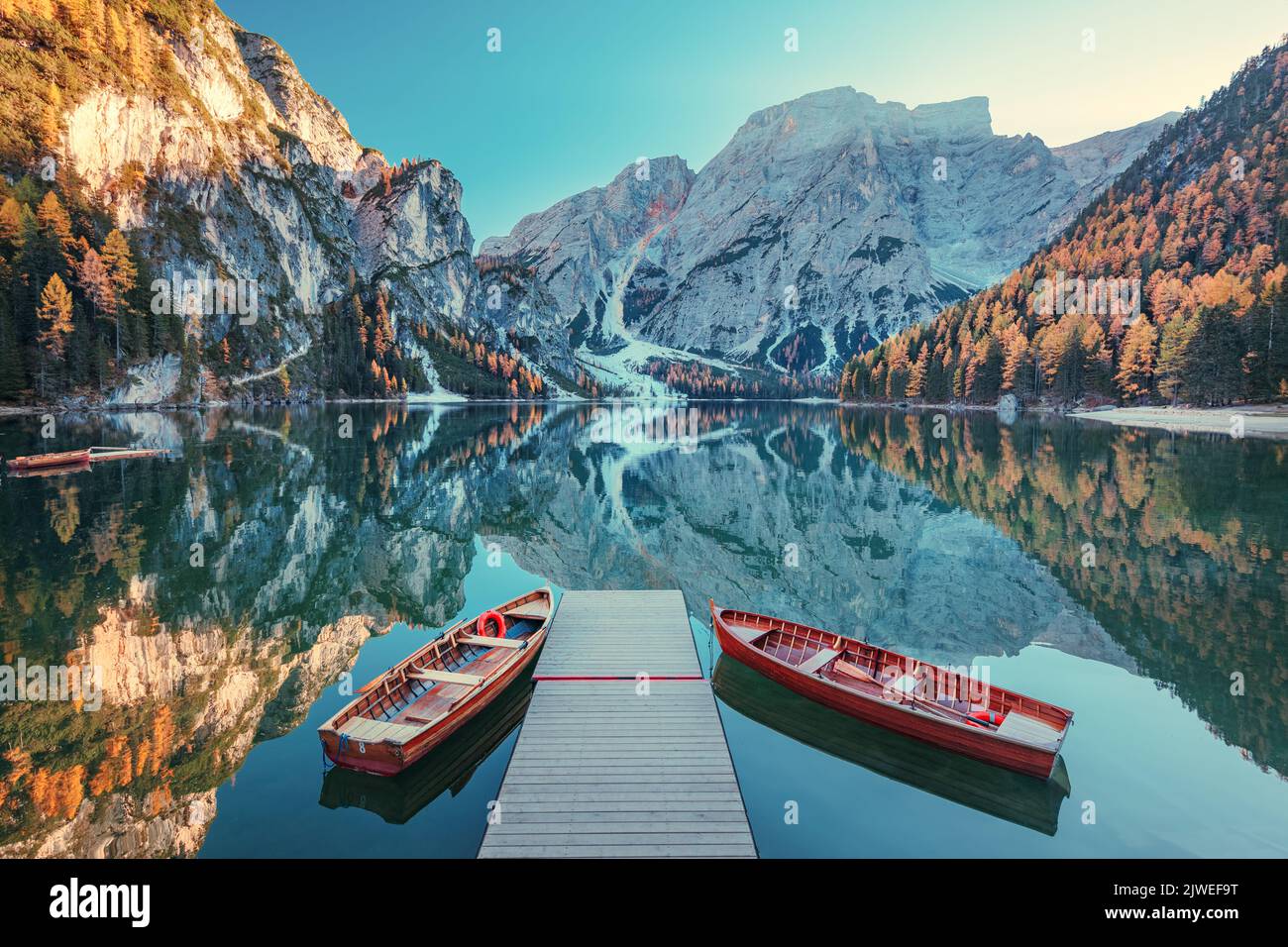 Boats on the Braies Lake ( Pragser Wildsee ) in Dolomites mountains, Sudtirol, Italy. Alps nature landscape. Stock Photo