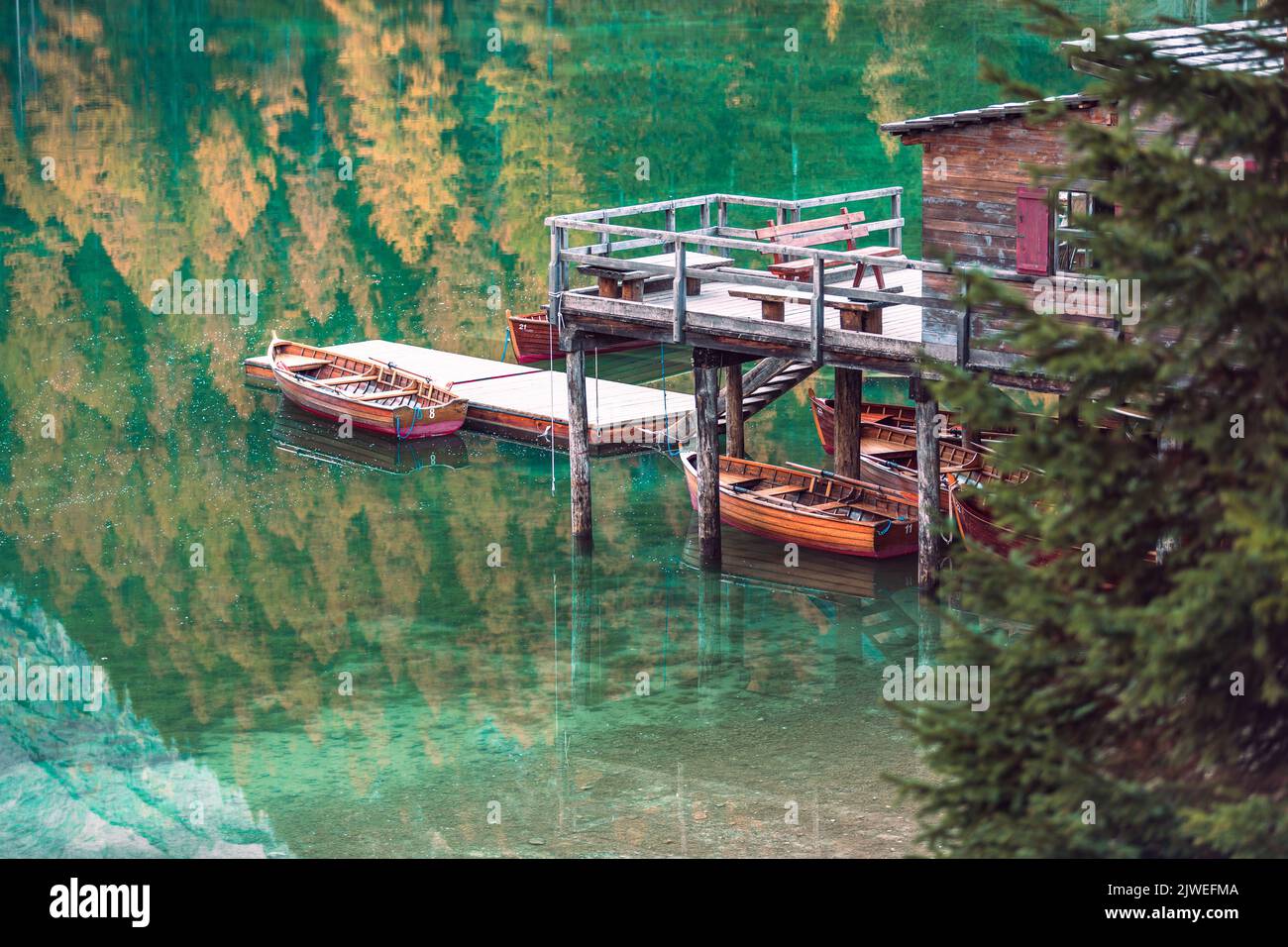 Boats on the Braies Lake ( Pragser Wildsee ) in Dolomites mountains, Sudtirol, Italy Stock Photo
