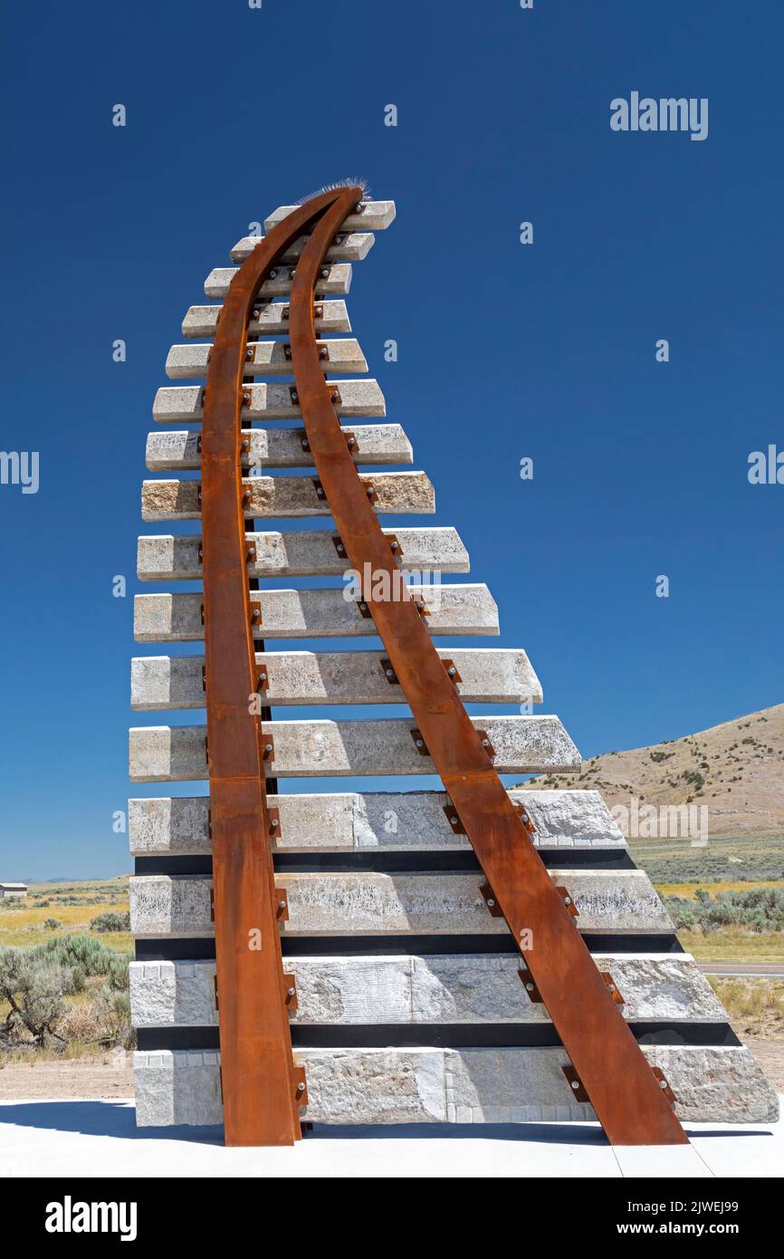 Promontory Summit, Utah - The 'Monument to Their Memory' at Golden Spike National Historic Park, where the first transcontinental railroad tracks were Stock Photo