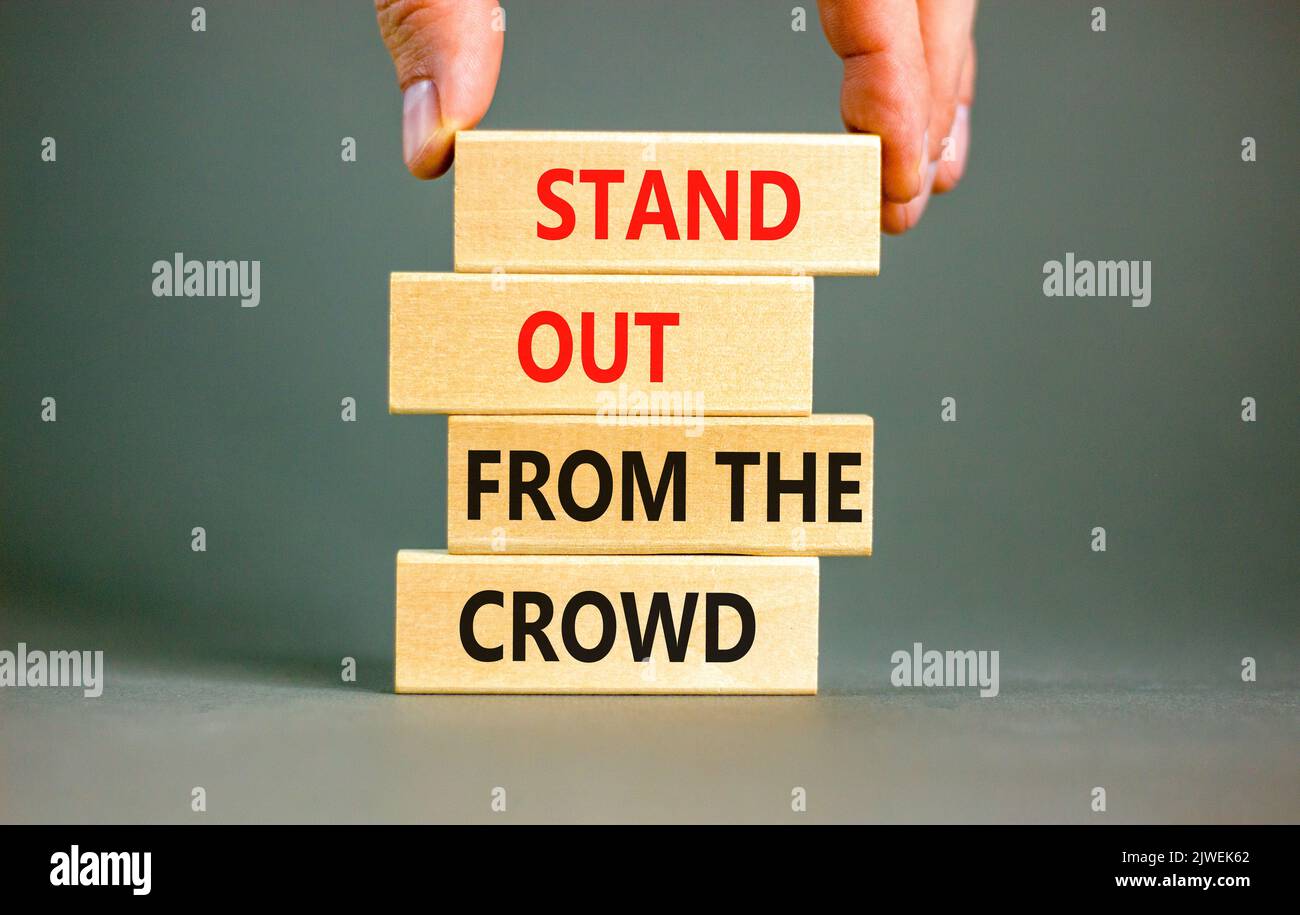 Stand out from the crowd symbol. Concept words Stand out from the crowd