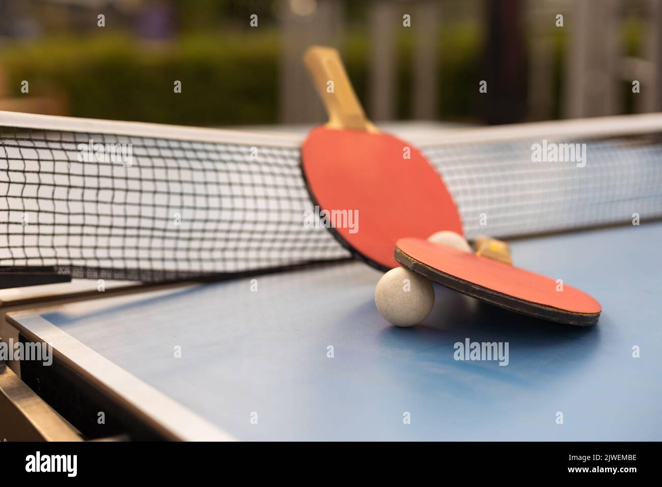 Ping Pong Table, Rackets And Balls In A Sport Hall Stock Photo - Alamy