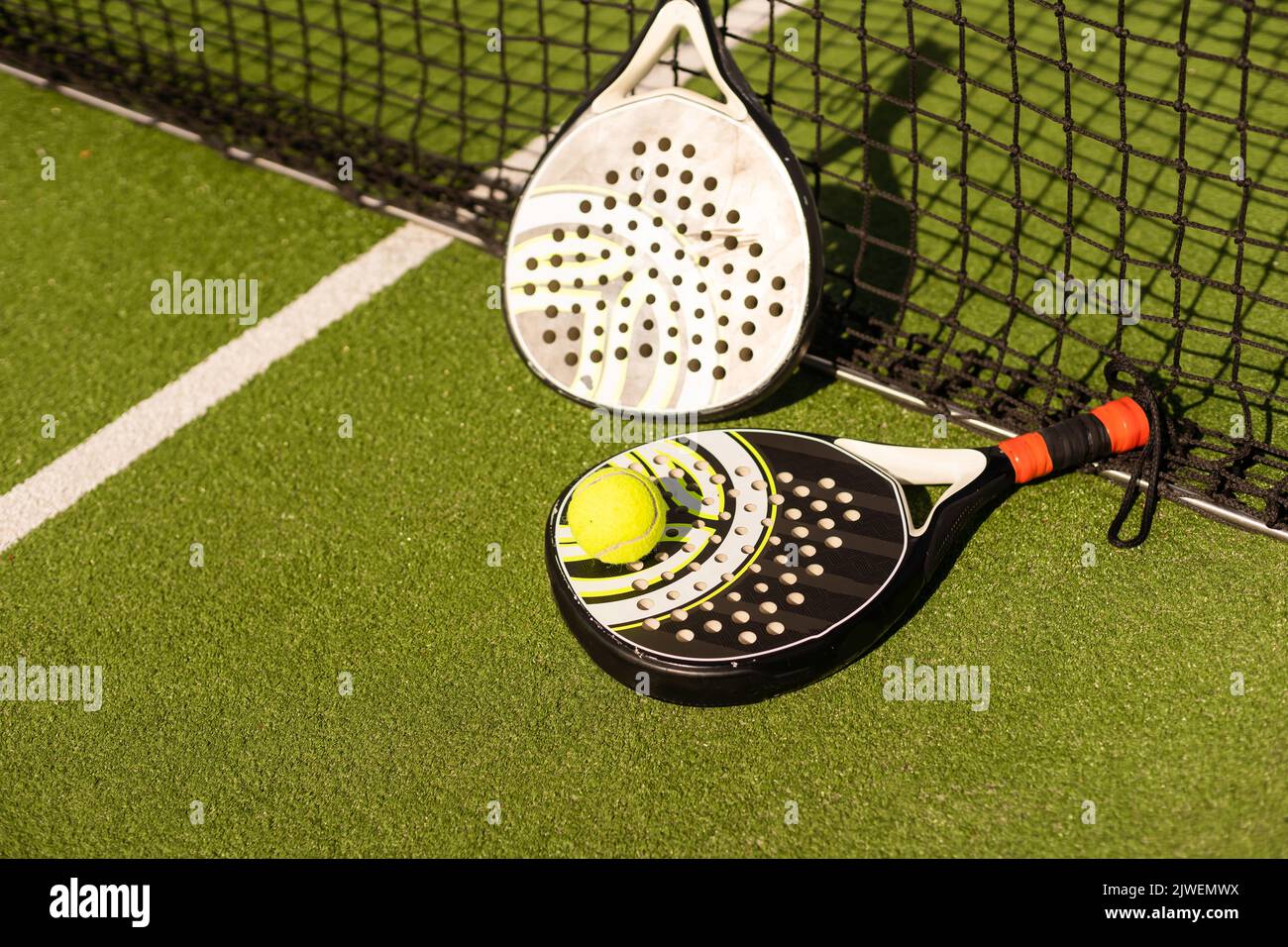 padel tennis racket sport court and balls Stock Photo Alamy