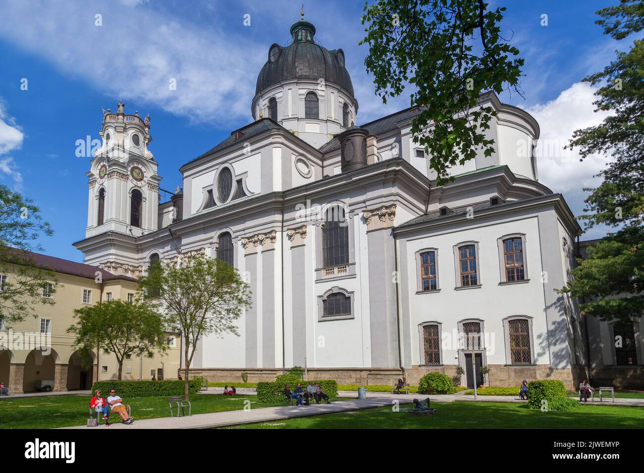 SALZBURG, AUSTRIA - MAY 17, 2019: This is a view of the Collegiate University Church from Furtwengler Park. Stock Photo