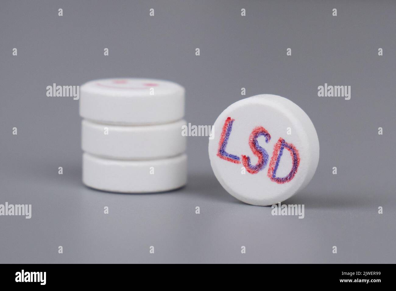 LSD pill, medical use of lsd to treat PTSD and depression. Stock Photo