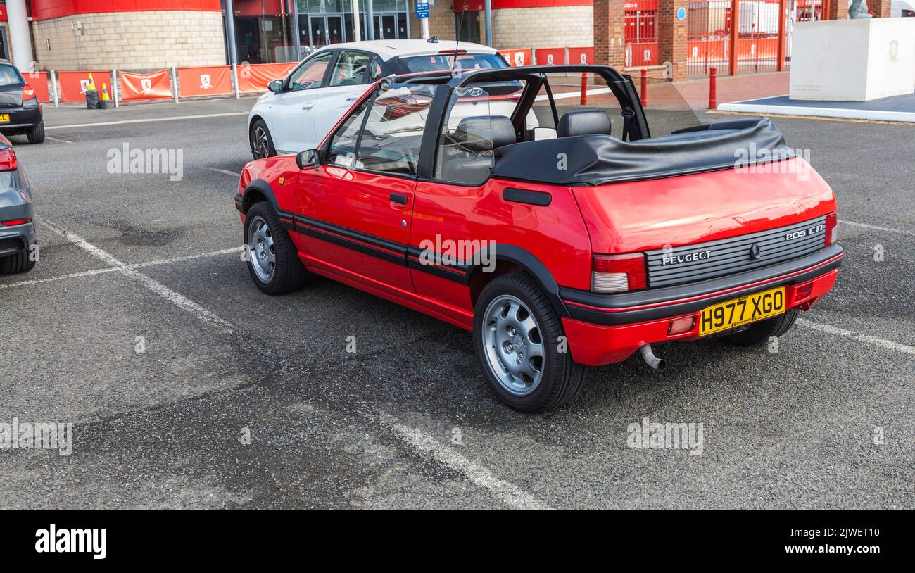 A red Peugeot 205 CTI car parked up in Middlesbrough,England,UK Stock Photo
