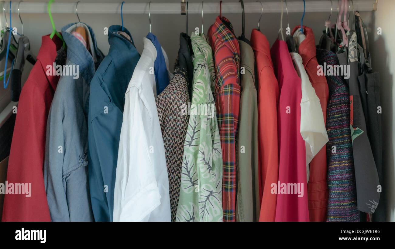 clothes in closet Stock Photo