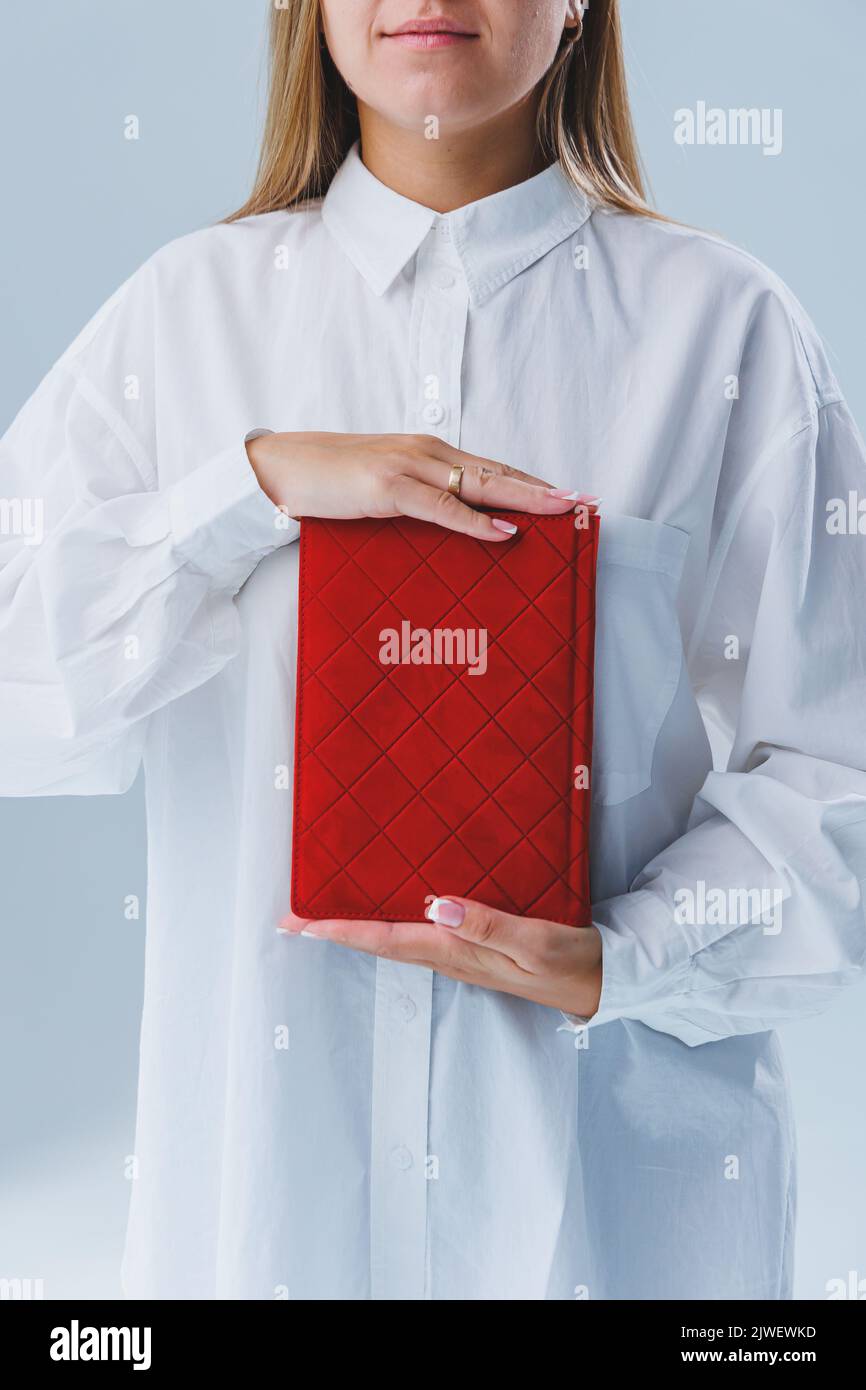 Red notebook for business notes. Women's case notebook Stock Photo