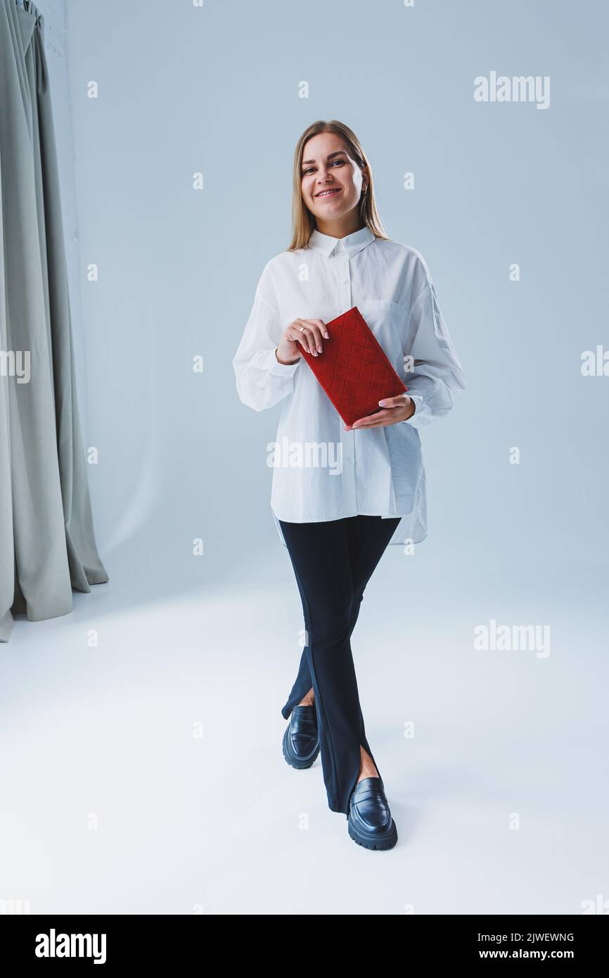 Red notebook for business notes. Women's case notebook Stock Photo