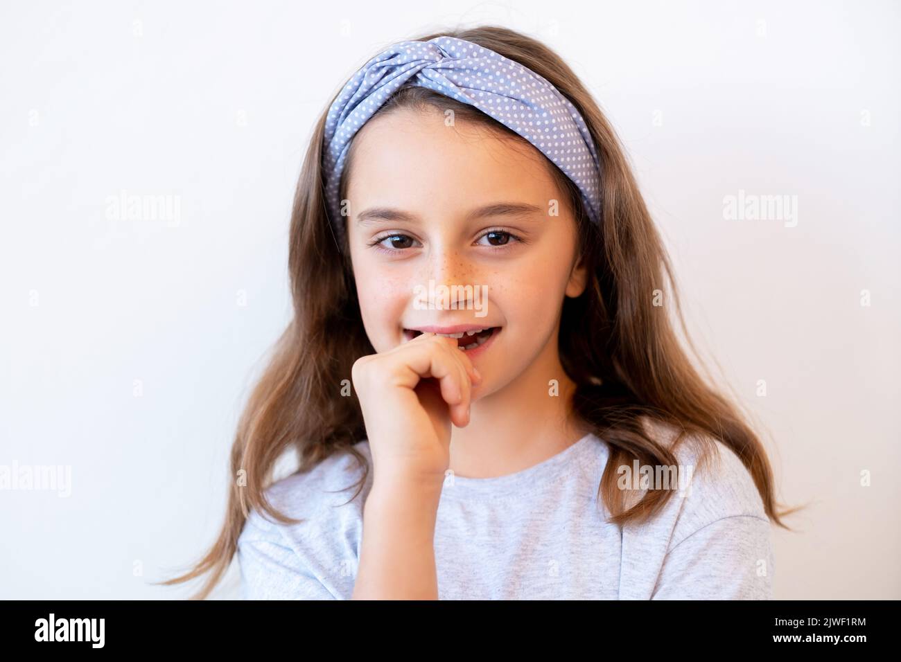 curious kid portrait child dream intrigued girl Stock Photo