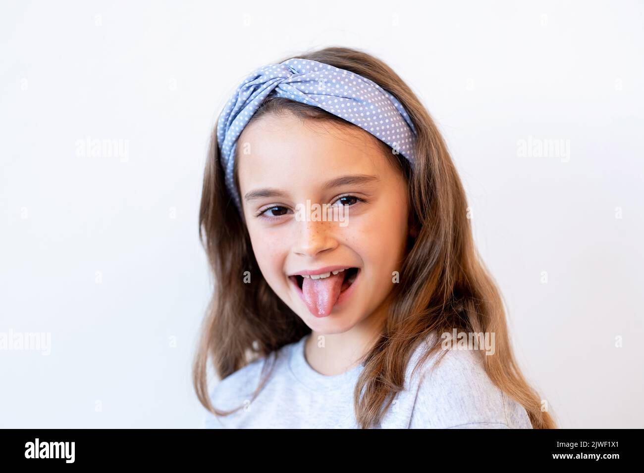 Active Black Kid Jumping Against Blue Background Stock Photo - Download  Image Now - Child, Jumping, Playful - iStock