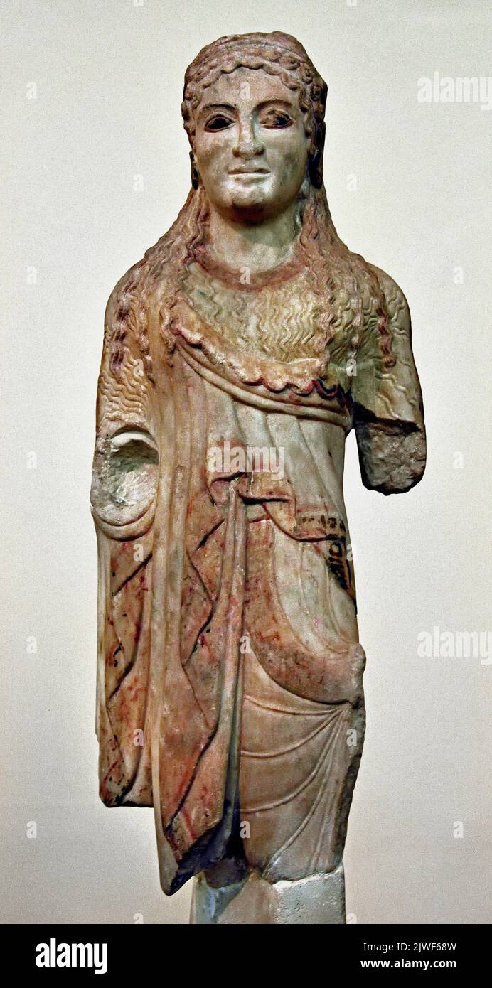 Ancient Greek Archaic statuette of a kore, Acropolis Athens, 500-490 BC National Archaeological Museum in Athens. Stock Photo
