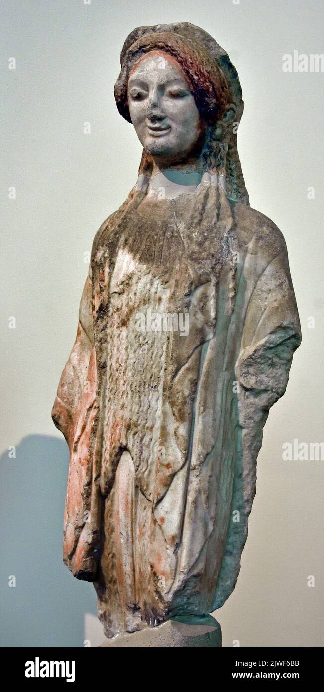 Ancient Greek Archaic statuette of a kore, Acropolis Athens, 490 BC National Archaeological Museum in Athens. Stock Photo