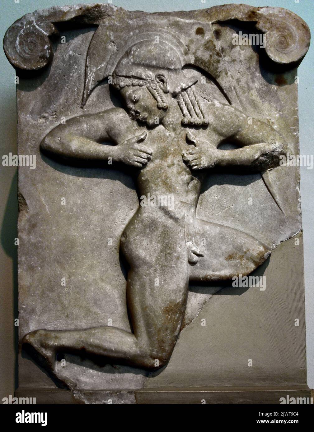 Hoplitodromos, Relief of a young man running, 500 BC, Pentelic marble, Found in Theseion, Athens, National Archaeological Museum in Athens. Stock Photo