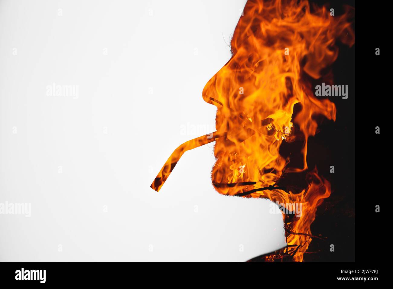 A Silhouette of a person on fire with double exposure effect while smoking  isolated on white background Stock Photo - Alamy