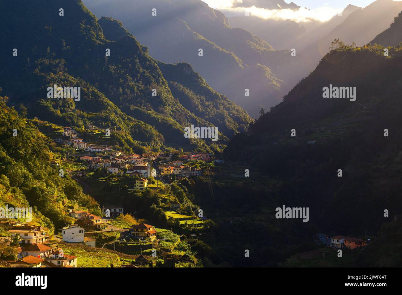 Sunset above villages in the mountains of Madeira Islands, Portugal Stock Photo