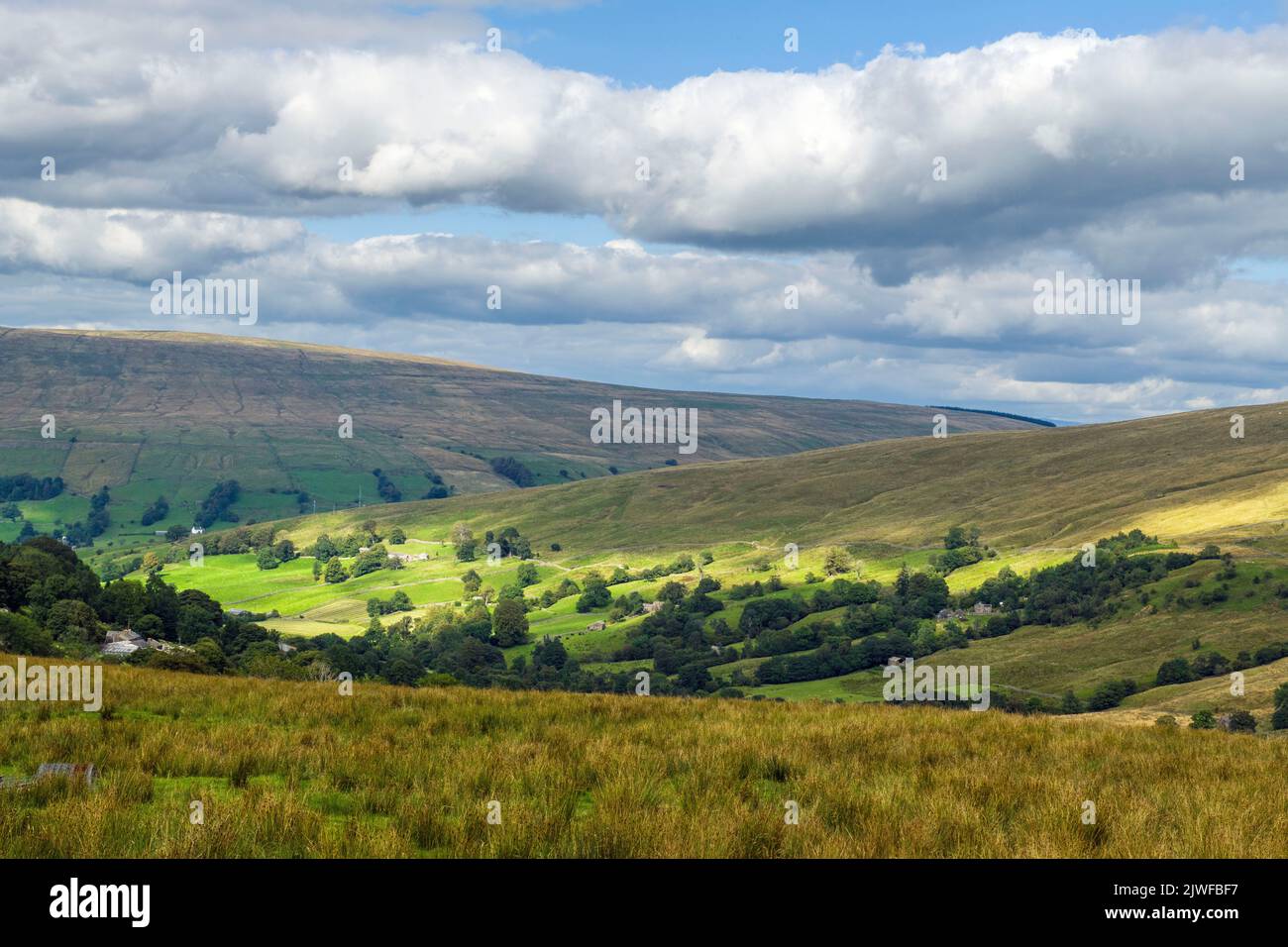 Deepdale off Dentdale with sunshine and shadows Cumbria Stock Photo