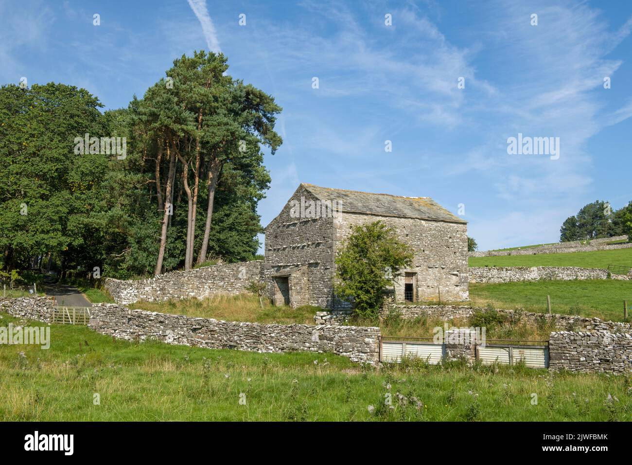 A stone barn close to Ravenstonedale in Cumbria on a sunny August day Stock Photo