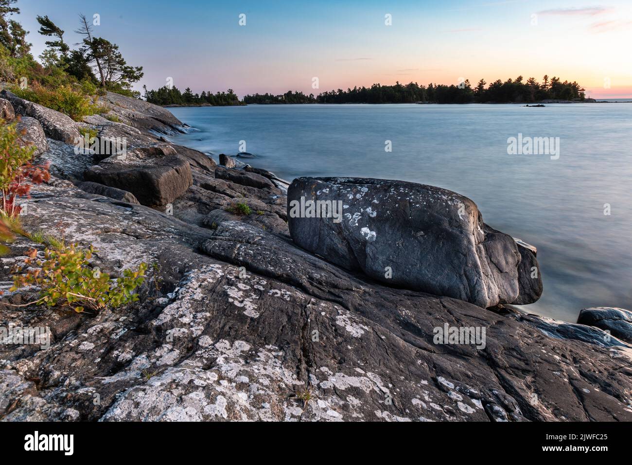 Shoreline of an island among the 30,000 island archipelago on the eastern side of the Georgian Bay in Ontario, Canada. Stock Photo