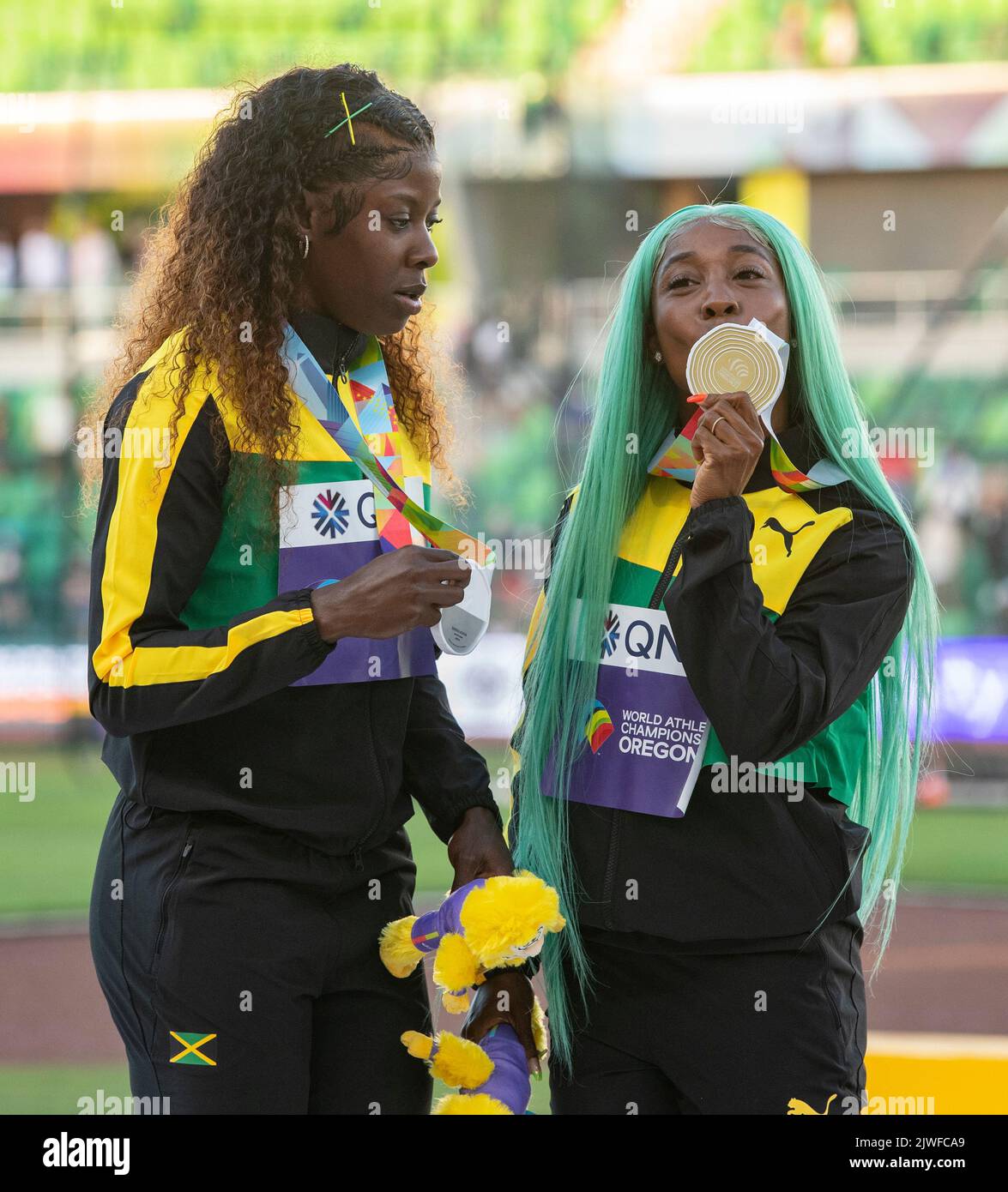 Shericka Jackson and ShellyAnn Fraser Pryce of Jamaica medal