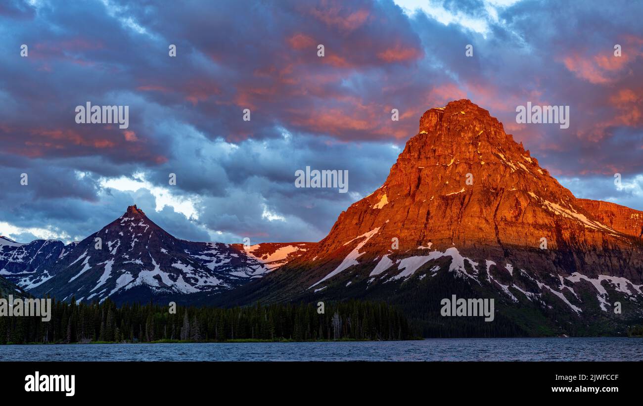Glacier Park in Montana lake and mountain at sunrise Stock Photo