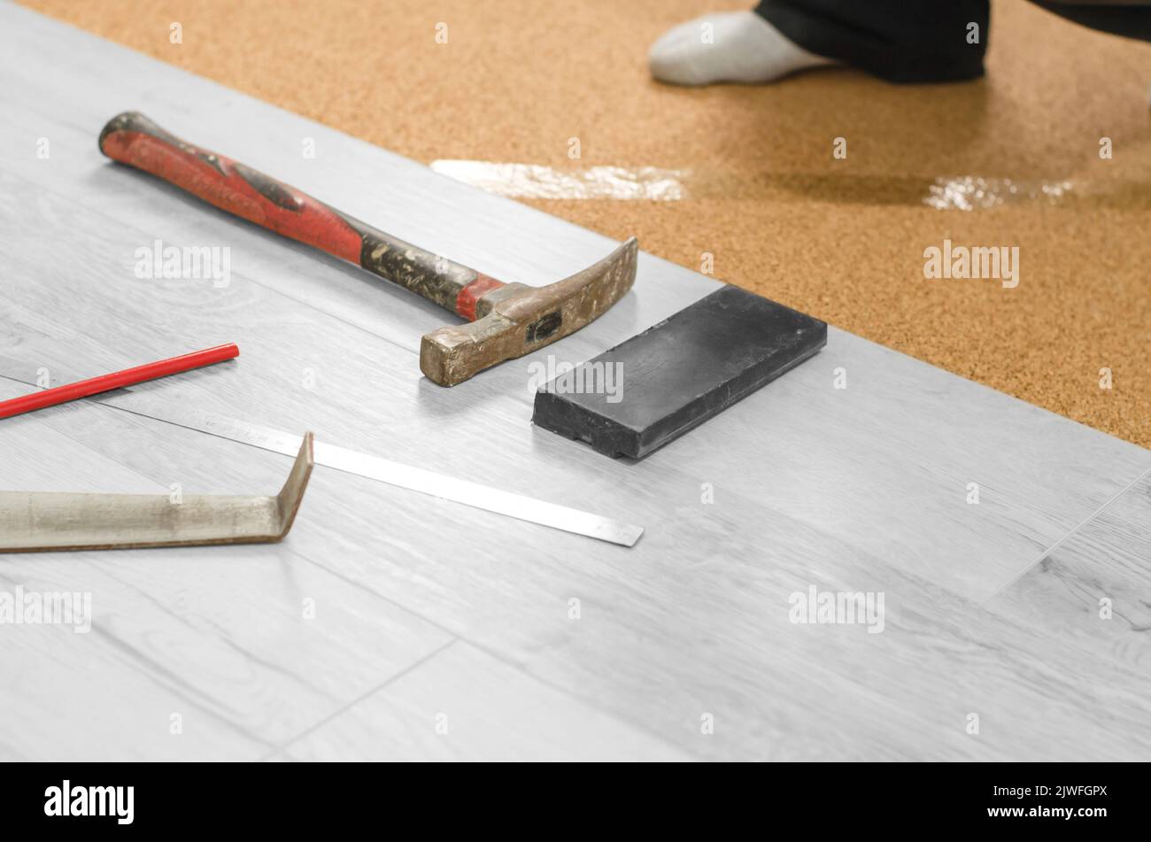 Professional laying of a floor covering a laminate. Laying laminate