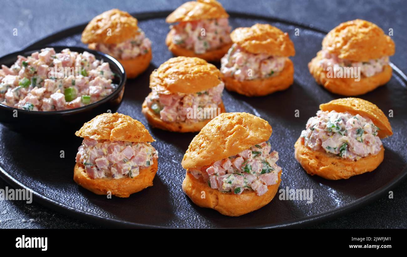 ham salad serving it sandwiched between airy gougeres, cheese puffs on