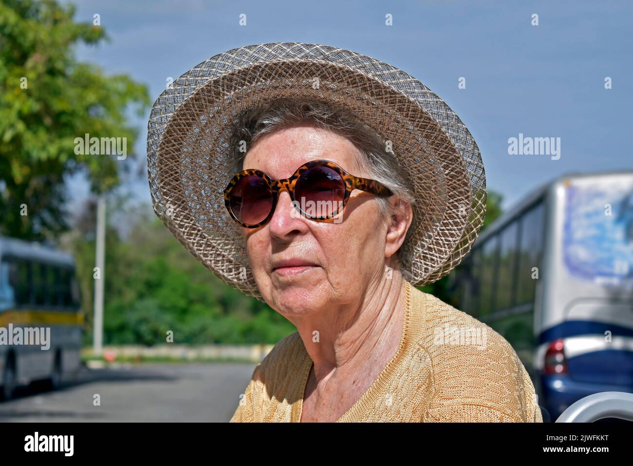 Old age pensioner woman sunbathing hi-res stock photography and images ...