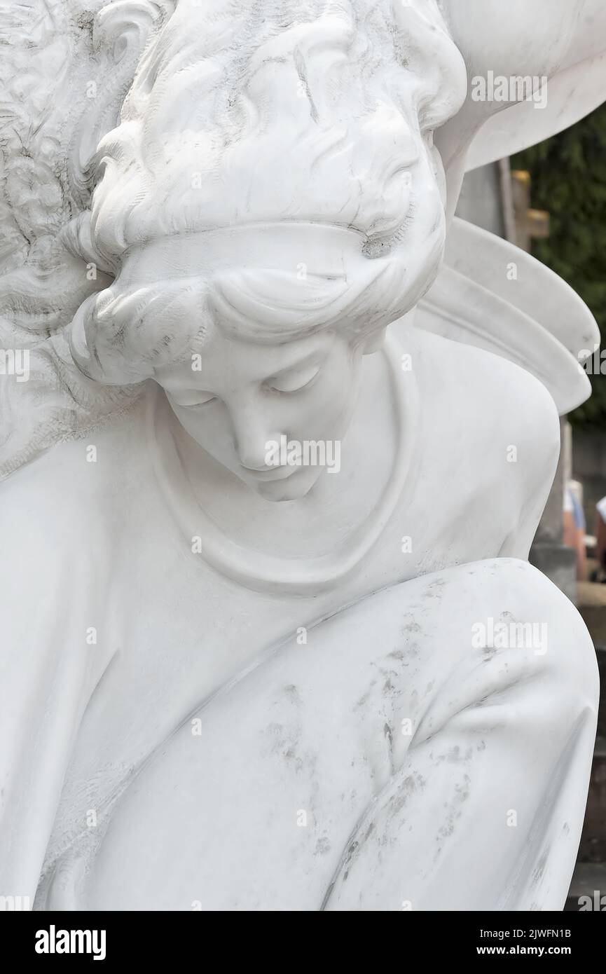 Closeup of white angel statue of Lychakiv Cemetery in Lviv, Ukraine Stock Photo