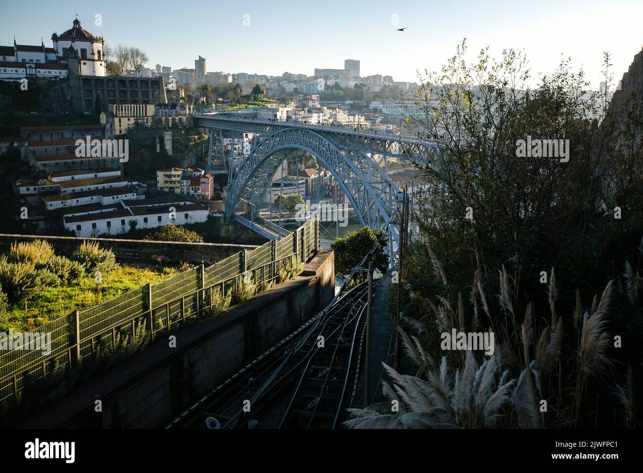 View of the Douro River and Dom Luis iron Bridge in Porto, Portugal. Stock Photo