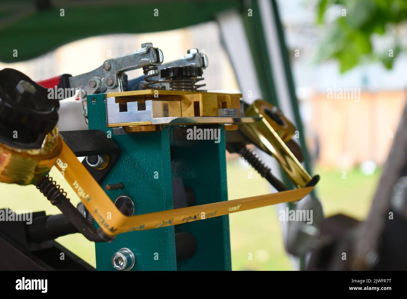 Engraving machine for book binding process Stock Photo Alamy